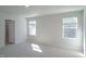 The room has an ensuite bathroom and large windows at 1730 Pie Filling Dr, Haw River, NC 27258