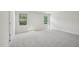 Bright bedroom featuring two windows with natural lighting at 1730 Pie Filling Dr, Haw River, NC 27258