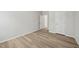 Bedroom featuring durable hardwood flooring and neutral walls at 1730 Pie Filling Dr, Haw River, NC 27258