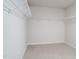 Walk-in closet complete with shelving to maximize storage at 1730 Pie Filling Dr, Haw River, NC 27258