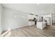 Modern, bright kitchen features stainless appliances, a center island, and an open-concept design at 1730 Pie Filling Dr, Haw River, NC 27258