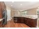 Well-lit kitchen with modern appliances, ample counter space, hardwood floors, and an open layout at 196 Norwich Dr, Clayton, NC 27520