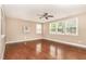 Spacious living room boasts hardwood floors, neutral decor, and lots of natural light at 196 Norwich Dr, Clayton, NC 27520