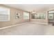 A naturally lit living room includes neutral paint, and windows for natural light at 196 Norwich Dr, Clayton, NC 27520