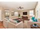 Inviting living room features hardwood floors, neutral decor, and an abundance of natural light at 196 Norwich Dr, Clayton, NC 27520