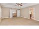 A neutral primary bedroom includes a view to an upper level hall, and a primary bathroom at 196 Norwich Dr, Clayton, NC 27520