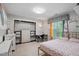Bright bedroom with large closet, desk, and gold frame bed at 215 Rocky Point Ct, Fuquay Varina, NC 27526