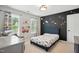 A bedroom featuring a themed Star Wars wall mural and matching bedspread at 215 Rocky Point Ct, Fuquay Varina, NC 27526