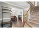 Inviting entryway with hardwood floors, staircase, and dining room access at 215 Rocky Point Ct, Fuquay Varina, NC 27526
