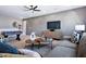 Finished bonus room with a gray accent wall, comfortable seating, and a foosball table at 217 George Hudson Rd, Siler City, NC 27344