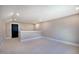 Spacious bonus room with neutral walls, carpet flooring, and plenty of natural light at 219 George Hudson Rd, Siler City, NC 27344