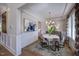 Elegant dining room with modern chandelier and decorative wainscoting at 219 George Hudson Rd, Siler City, NC 27344