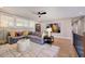 Relaxing living room with a gray sofa, colorful pillows, and stylish decor at 219 George Hudson Rd, Siler City, NC 27344