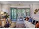 Relaxing screened porch provides a serene outdoor living space with wooded views at 219 George Hudson Rd, Siler City, NC 27344