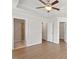 Spacious main bedroom features a ceiling fan, plus doorways to the bathroom and the walk-in closet at 2211 Sweet Annie Way, Wake Forest, NC 27587
