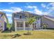 Backyard featuring a screened-in porch and solar panels on the roof at 2217 Holtwood Way, Apex, NC 27523
