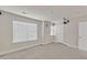 Finished basement with gray carpet, white walls, a window, and recessed lighting at 2217 Holtwood Way, Apex, NC 27523