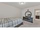 Bedroom with carpet, a bed with a plaid blanket, dresser with mirror, and overhead lighting at 2217 Holtwood Way, Apex, NC 27523
