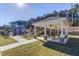 Community cabana with ceiling fans, picnic tables, and playground in the background at 2217 Holtwood Way, Apex, NC 27523