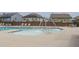 Community pool with splash pad and seating for residents at 2217 Holtwood Way, Apex, NC 27523