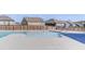 Community pool splash pad feature with easy access handrails and views of neighborhood homes at 2217 Holtwood Way, Apex, NC 27523