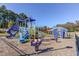 Community playground with multiple slides and climbing features at 2217 Holtwood Way, Apex, NC 27523