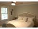 Bright bedroom with a comfortable bed, bedside tables, and a ceiling fan at 2603 Red Pine Rd, Hillsborough, NC 27278