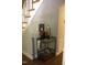 Hallway nook showcasing a charming coffee bar setup under the staircase at 2603 Red Pine Rd, Hillsborough, NC 27278