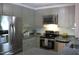 Updated kitchen featuring stainless steel appliances and a clean, functional layout at 2603 Red Pine Rd, Hillsborough, NC 27278