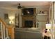 Cozy living room features a brick fireplace, ceiling fan, and comfortable seating at 2603 Red Pine Rd, Hillsborough, NC 27278