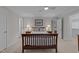 This bedroom features natural light, wooden furniture, and neutral walls at 2616 Dockery Ln, Raleigh, NC 27606