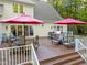 A spacious deck with a table, chairs, and grill, perfect for outdoor entertaining at 2616 Dockery Ln, Raleigh, NC 27606