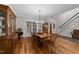 Elegant dining room featuring hardwood floors, a chandelier, and classic decor at 2616 Dockery Ln, Raleigh, NC 27606