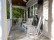 Inviting front porch with rocking chairs, offering a relaxing outdoor space at 2616 Dockery Ln, Raleigh, NC 27606