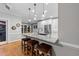Modern kitchen with granite countertops, stainless steel appliances, and a breakfast bar at 2616 Dockery Ln, Raleigh, NC 27606