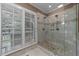 Modern bathroom showcasing a glass-enclosed shower with multiple showerheads at 2616 Dockery Ln, Raleigh, NC 27606
