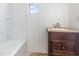 Modern bathroom features a new vanity, tub, and white beadboard walls at 2670 Nc 210 S, Lillington, NC 27546