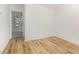 Cozy bedroom featuring wood floors and plenty of natural light at 2670 Nc 210 S, Lillington, NC 27546