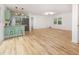 An open layout connects the living area with the updated kitchen and breakfast bar seating at 2670 Nc 210 S, Lillington, NC 27546