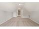 Large bonus room with built-in shelving offers versatile space for entertainment or hobbies at 2720 Snowy Meadow Ct, Raleigh, NC 27614