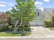 Charming home featuring a two-car garage, landscaped front yard, and inviting front porch, perfect for relaxation at 2720 Snowy Meadow Ct, Raleigh, NC 27614