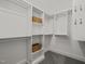 Well-organized walk-in closet with built-in shelving and ample storage space at 2720 Snowy Meadow Ct, Raleigh, NC 27614