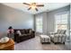 Bedroom offers comfortable furniture, neutral walls and large windows with lots of natural light at 2910 Reynolda Cir, Durham, NC 27712