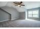 Spacious bedroom features neutral carpet, ceiling fan, and a window providing natural light at 2910 Reynolda Cir, Durham, NC 27712