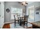 Charming dining area features hardwood floors, natural light, and vaulted ceilings at 2910 Reynolda Cir, Durham, NC 27712