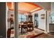 Formal dining room featuring an elegant chandelier, wainscoting, and a large window at 2910 Reynolda Cir, Durham, NC 27712