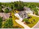 Beautifully landscaped home boasts a well-manicured lawn, providing a welcoming curb appeal at 2910 Reynolda Cir, Durham, NC 27712