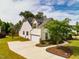 Aerial view of a lovely home with a well-maintained lawn and concrete driveway at 2910 Reynolda Cir, Durham, NC 27712