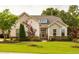 Beautiful single-story house exhibiting lush green lawn and inviting curb appeal at 2910 Reynolda Cir, Durham, NC 27712