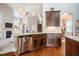Inviting kitchen featuring granite counters, stainless dishwasher, and stylish cabinetry at 2910 Reynolda Cir, Durham, NC 27712